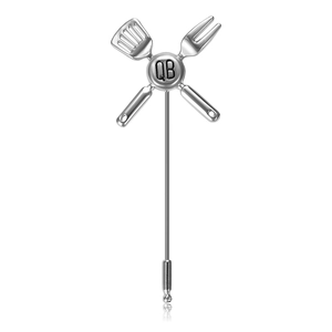 Creative silver alloy enamel kitchen brooch with crossed spatula and fork utensil design