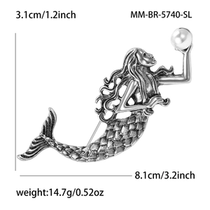 Detailed size view of retro silver mermaid brooch with pearl, 8.1cm wide and 3.1cm high