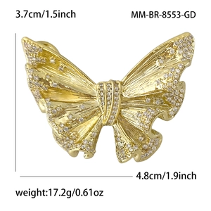 Elegant gold butterfly brooch with micro-pave zircons, dimensions 4.8cm by 3.7cm