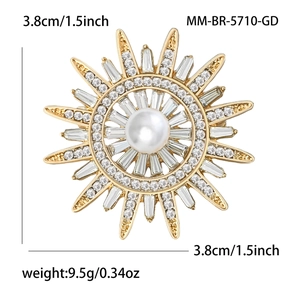 Broche soleil dorée élégante avec perle centrale et strass brillants pour femmes
