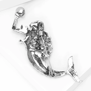 Detailed back view of silver mermaid brooch showing vintage metal texture and secure pin clasp