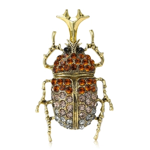 Vintage unicorn beetle brooch with multicolored rhinestones and gold-plated finish
