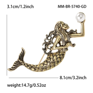 Vintage gold mermaid brooch with white pearl, dimensions 8.1cm by 3.1cm shown on white background