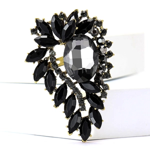 Elegant vintage style gold alloy brooch featuring a large grey stone and black crystals