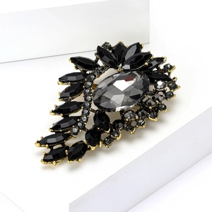 Elegant vintage flower brooch with black faceted crystals and gold alloy plating