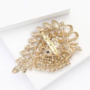 Detailed back view of large alloy glass brooch showing the secure pin buckle and hollow texture