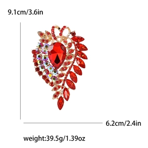 Luxurious large alloy brooch with red teardrop crystals and gold finish for women