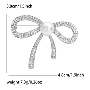 Dimensions détaillées de broche nœud 4.8cm avec strass et perle centrale blanche