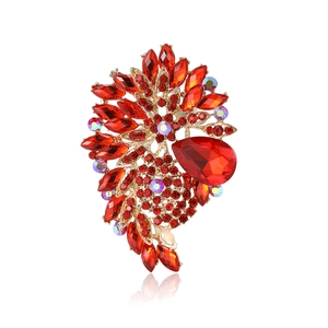 Elegant African red crystal brooch with gold alloy base and sparkling rhinestones