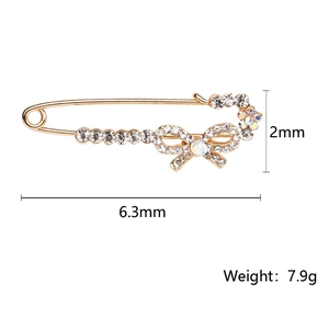Broche épingle de sûreté dorée avec cristaux et strass pour costumes de femmes