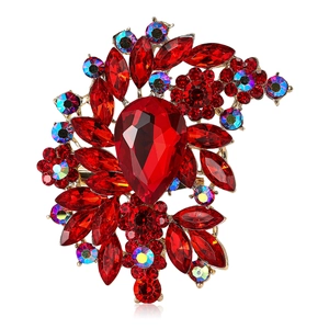 Vintage large floral alloy brooch with red pear-cut crystal and gold plating