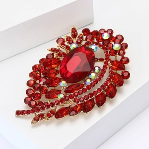 Luxurious red gemstone brooch with vintage gold alloy base and sparkling rhinestones