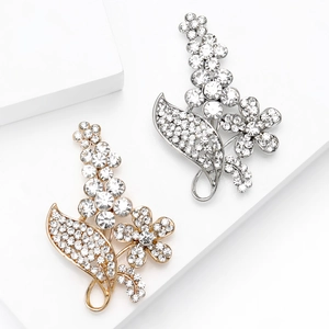 Elegante Blumenbroschen mit Gold- und Silberbeschichtung und Kristallcluster-Details