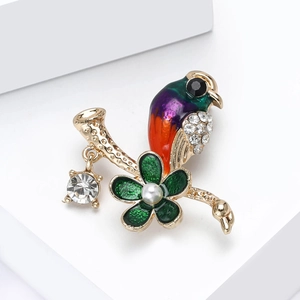 Creative enamel pigeon brooch with colorful crystals and pearl on gold branch