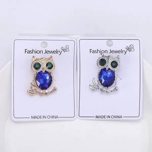 Exquisite owl brooches in gold and silver finish with blue and green crystals