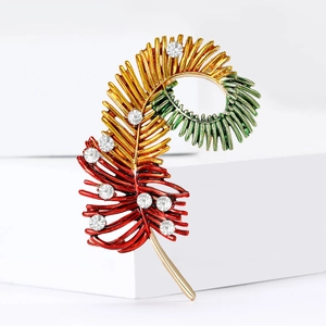 Vintage gold brooch with feather design, enamel gradient colors and white rhinestones