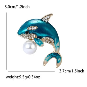 Prachtige blauwe emaille orka broche met witte strass steentjes en grote parel