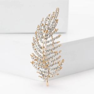 Élégante broche feuille dorée sertie de strass blancs brillants pour vestes femme