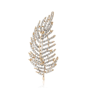 Broche élégante en plume dorée avec strass scintillants pour costumes et manteaux femme