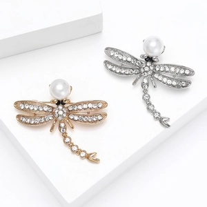 Elegant dragonfly brooch with sparkling rhinestones and white pearl in gold and silver finish
