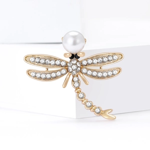 Elegant dragonfly brooch with pearl and sparkling rhinestones on golden metal base