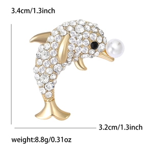 Broche dauphin dorée avec cristaux étincelants et perle blanche, dimensions incluses
