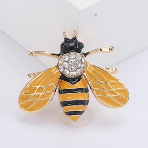 Exquisite mini bee brooch with yellow enamel wings and sparkling rhinestones on gold base