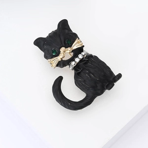 Cute black enamel cat brooch with green gem eyes and sparkling rhinestone collar