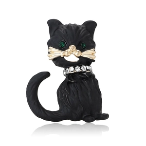 Elegant black cat brooch with green gemstone eyes and sparkling rhinestone collar