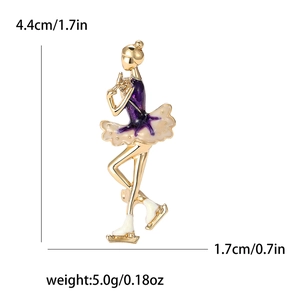 Elegant ballerina brooch with purple enamel and gold plating, measures 4.4cm by 1.7cm