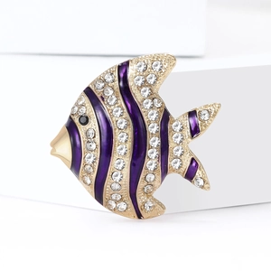 Golden tropical fish brooch with purple enamel stripes and shimmering rhinestones