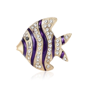 Elegant tropical fish brooch in gold alloy with purple enamel and sparkling crystals