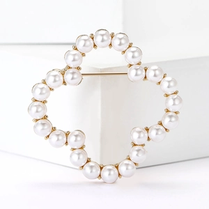 Elegant hollow floral cloud brooch with white pearls and gold alloy setting for women