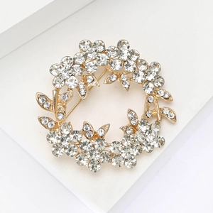 Élégante broche couronne florale sertie de strass brillants sur alliage doré
