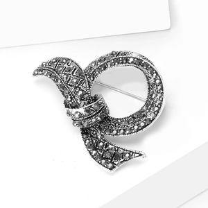 Luxury alloy bow brooch with dark rhinestones in a vintage silver-plated finish