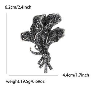 Vintage black orchid bouquet brooch with rhinestones and gunmetal finish for women