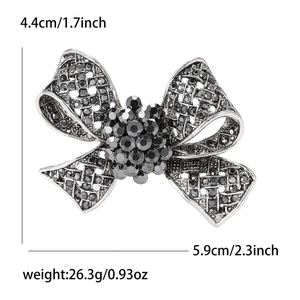 Broche nœud vintage luxueuse avec strass noirs et cristaux pour femmes élégantes