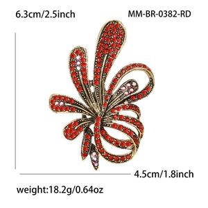 Luxury vintage floral rhinestone brooch in red crystal and antique gold finish