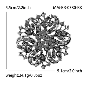Luxury vintage floral brooch with dark rhinestones in antique silver hollow design
