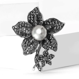 Vintage gunmetal floral brooch with grey pearl and sparkling crystals in antique silver