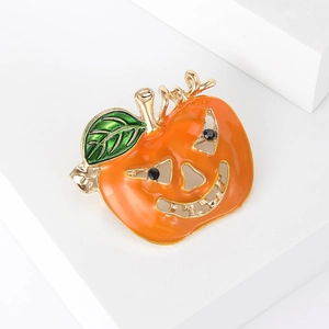 Broche citrouille d'Halloween en alliage doré avec émail orange et strass noirs