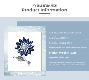 Detail view of sunflower brooch showing silver alloy base and deep blue crystal inlay