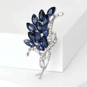 Elegant floral blue crystal brooch in silver alloy setting with sparkling pave rhinestones
