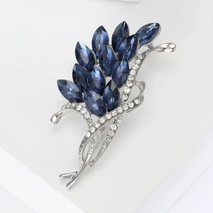 Elegant silver wheat-shaped brooch with deep blue marquise crystals and white rhinestones