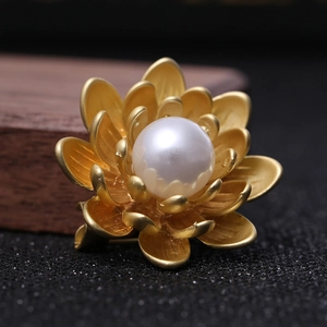 Matte gold lotus flower brooch with center pearl for elegant coats and jackets