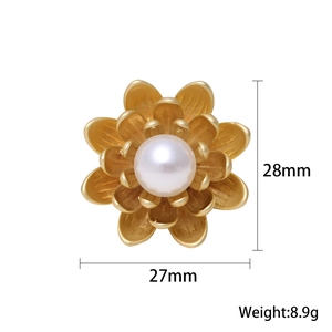 Matte gold floral pearl brooch featuring elegant 3D petals and a white center pearl