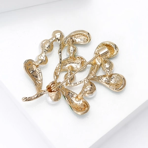 Elegante grüne Emaille Pflanzen Brosche mit weißer Perle in goldener Rückansicht