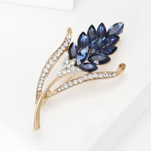 Eleganter goldener Weizen-Brosche mit blauen Markis-Kristallen und weißen Diamanten
