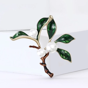 Elegant plant-shaped brooch with three white pearls and green enamel leaves decoration