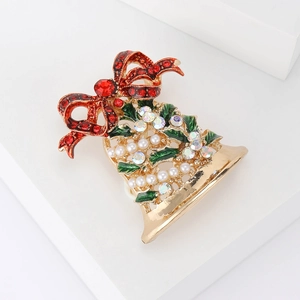 Broche de cloche de Noël exquise avec nœud en strass rouge et perles sur base dorée